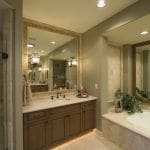 Luxury Bathroom with shower, vanity, and bath in photo