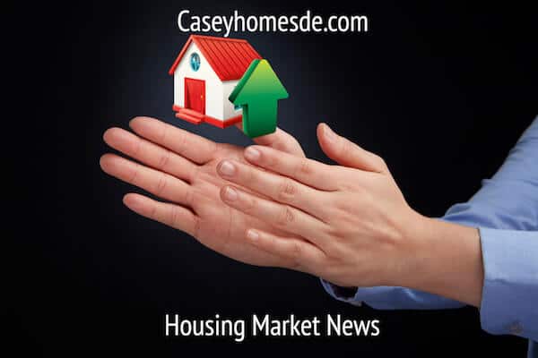 Newark housing market news text over photo of 2 hands with house over them and green arrow pointing upwards